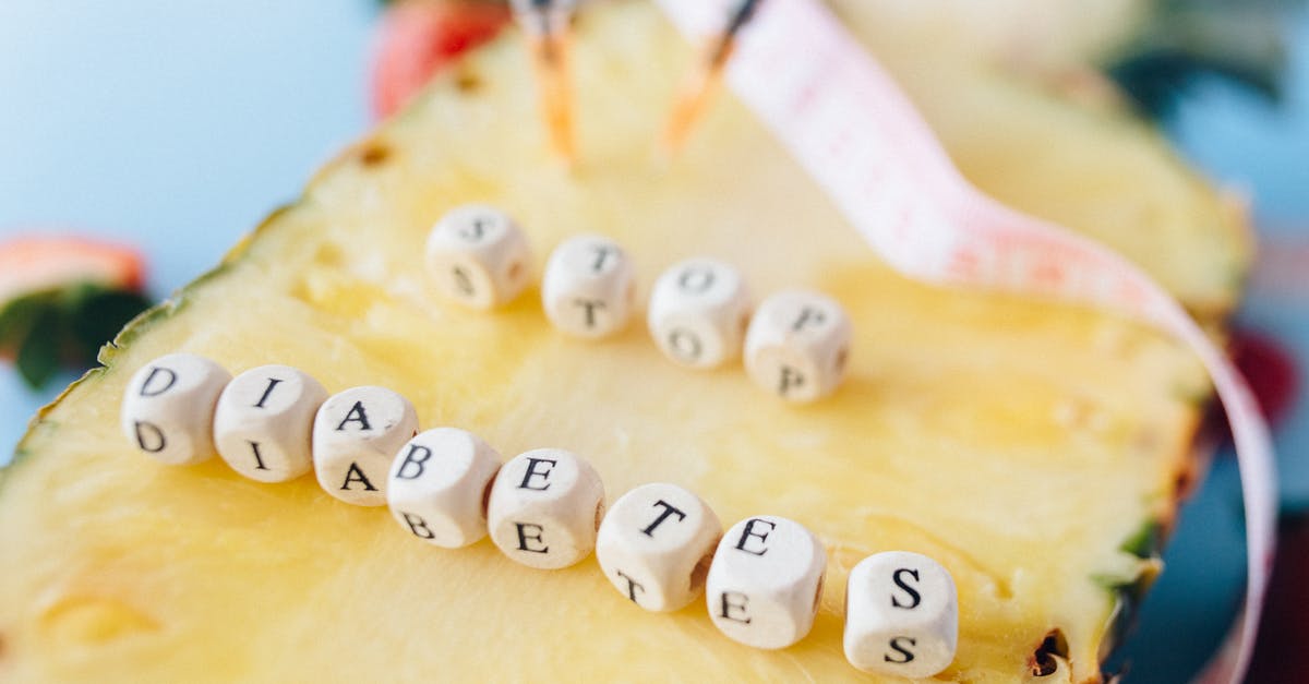 What caused the infertility? - Letter Dices over a Cut Pineapple Fruit