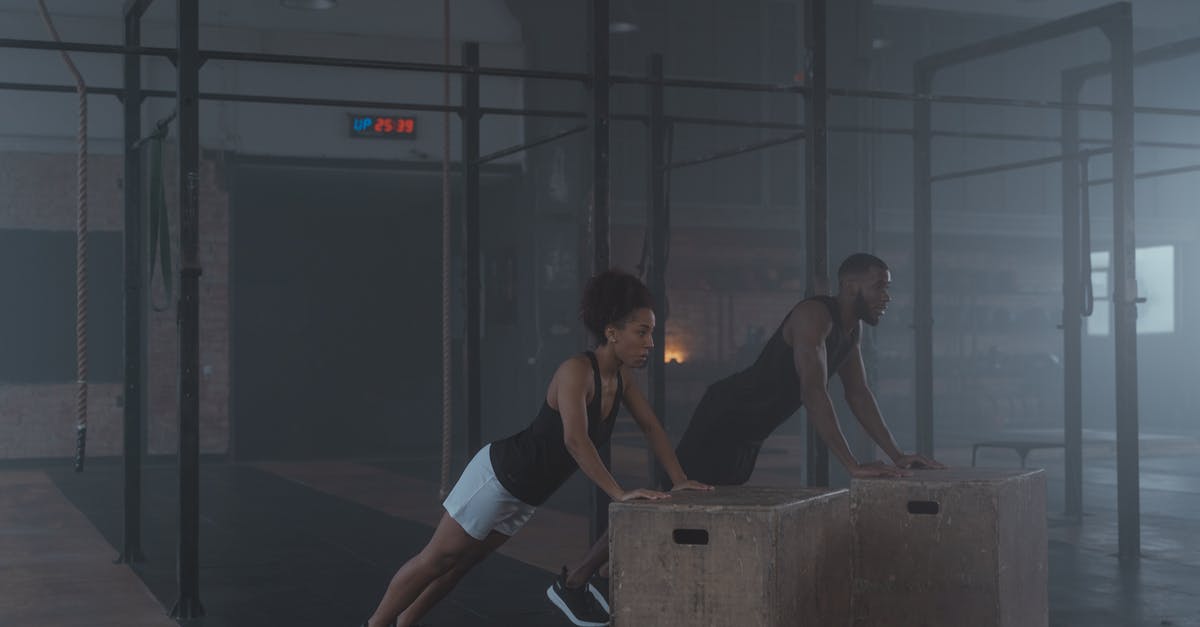 What did collapsing islands signify in "Inside Out"? - A Man and Woman in Black Tank Top Working Out Inside the Gym