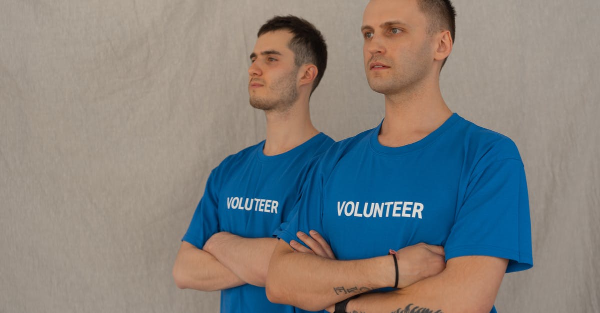 What did Marmee see in the man when she is volunteering? - Photo of Volunteers Crossing Their Arms