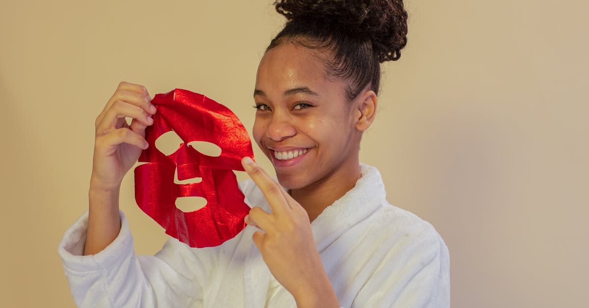 What did the color Red symbolize in "American Beauty"? - Cheerful black teenager with hydrating mask on beige background