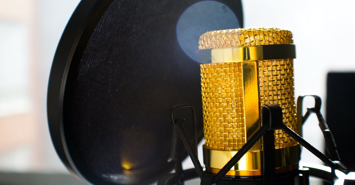 What does Herb's build-up to broadcast mean? - Close Up Photo of Gold-colored and Black Condenser Microphone