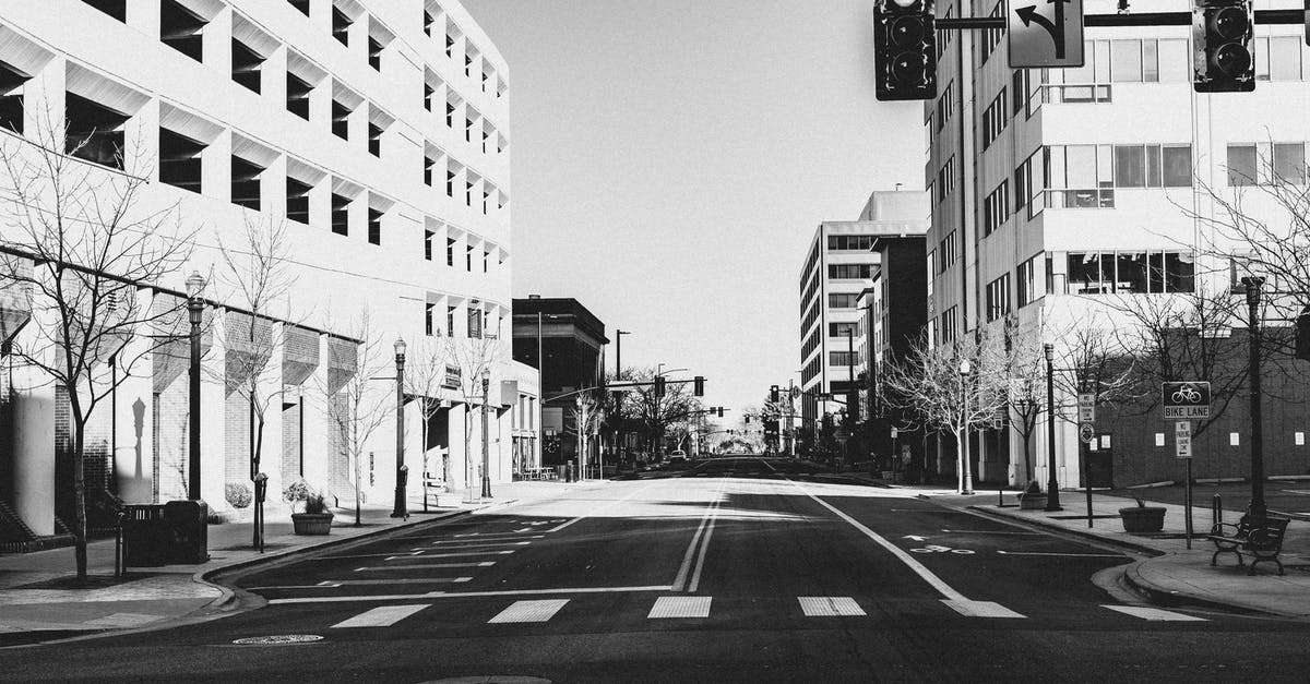What does Marty Jr yell while crossing the street in BTTF2? [closed] - Grayscale Photo Of City Buildings