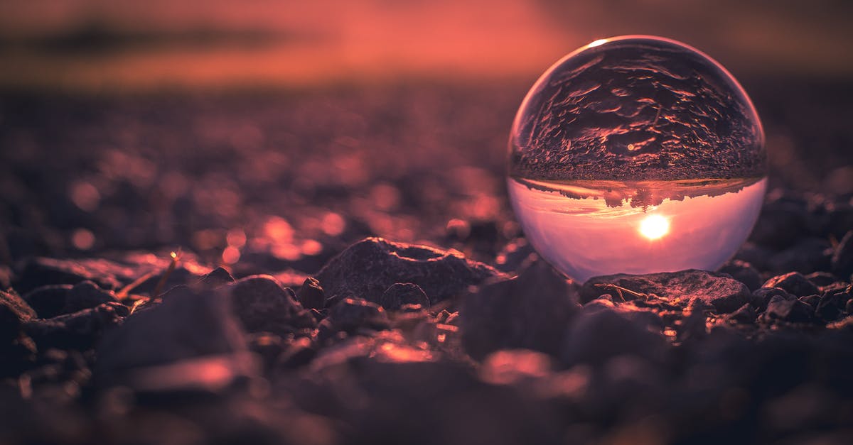 What does Sam Lombardo mean by "Never let the sun go down on an argument"? - Close-Up Photo of Lensball