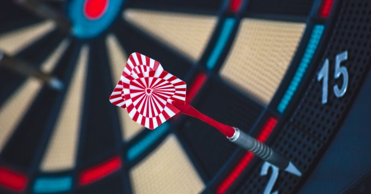 What does the arrow hit in the end of The Head Hunter? - Red and White Dart on Darts Board