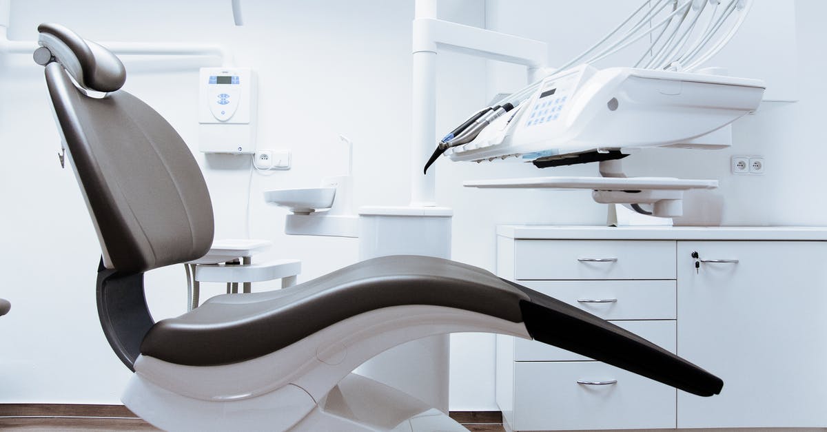 What does the doctor mean by "plastic" in Room? - Black and White Dentist Chair and Equipment