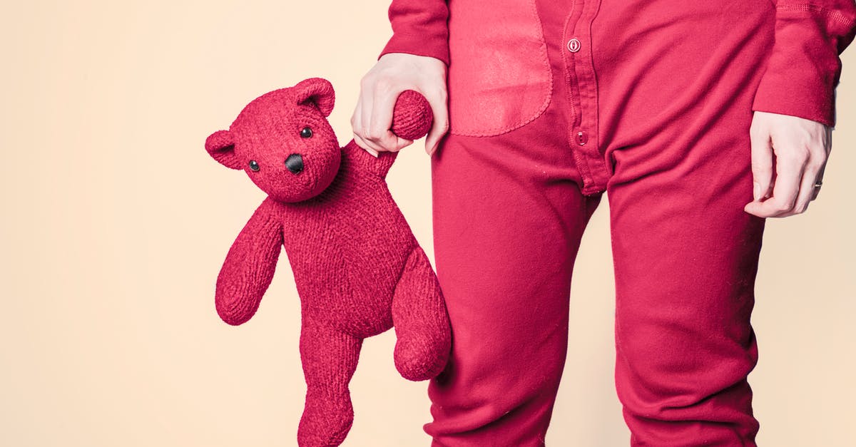 What does the pink teddy bear represent in Breaking Bad? - Person Holding Red Bear Plush Toy
