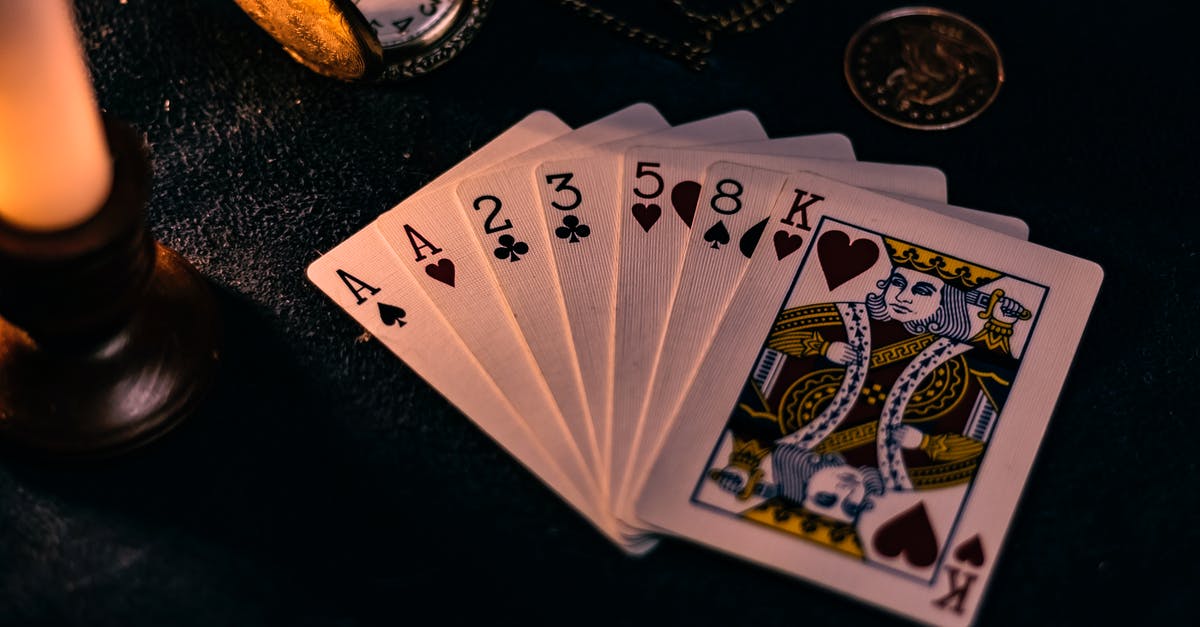 What does this mean in Ace Ventura? - Close-Up Photo of Playing Cards