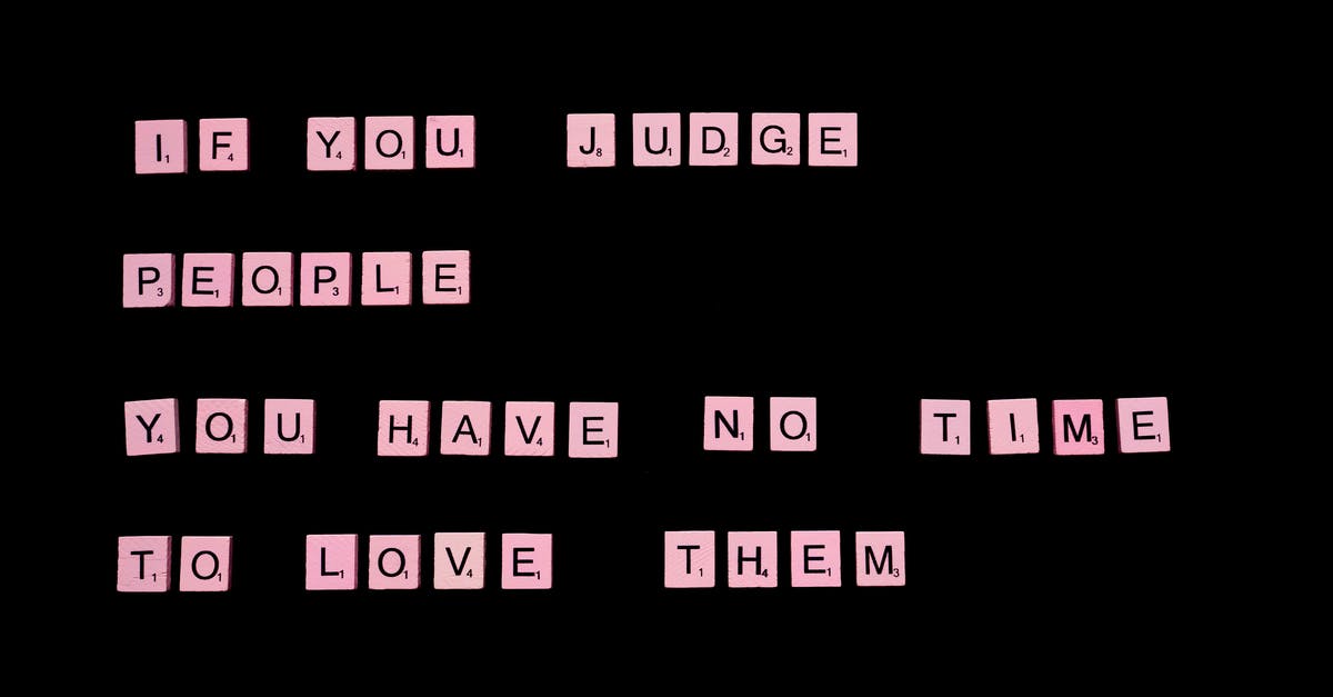 What does this phrase refer to? - If You Judge People You Have No Time To Love Them text spelled out with pink letter tiles of famous word game against black background