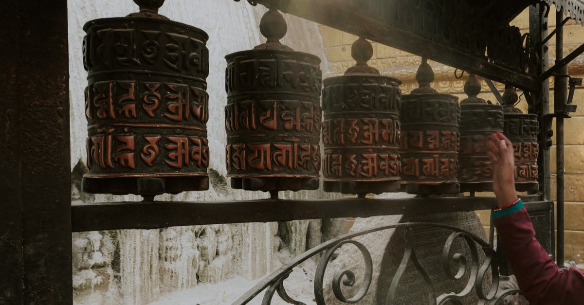 What happened to spinning wheels which were burned? - A Person Spinning Prayer Wheels 