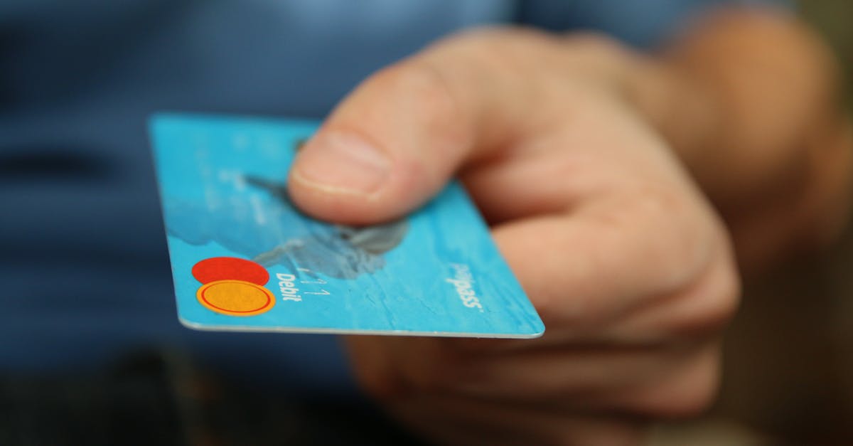 What happened to the debts of 456? - Person Holding Debit Card