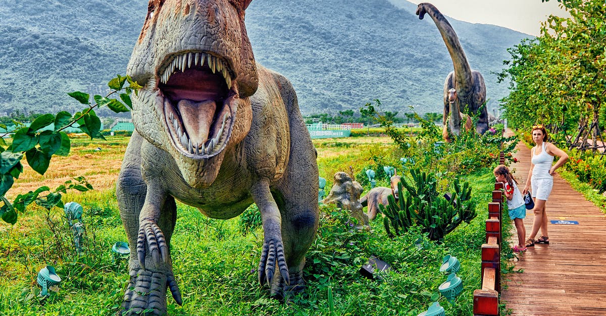 What happened to the dinosaurs from Jurassic Park? - Brown and Gray Dinosaur Statue on Green Grass Field