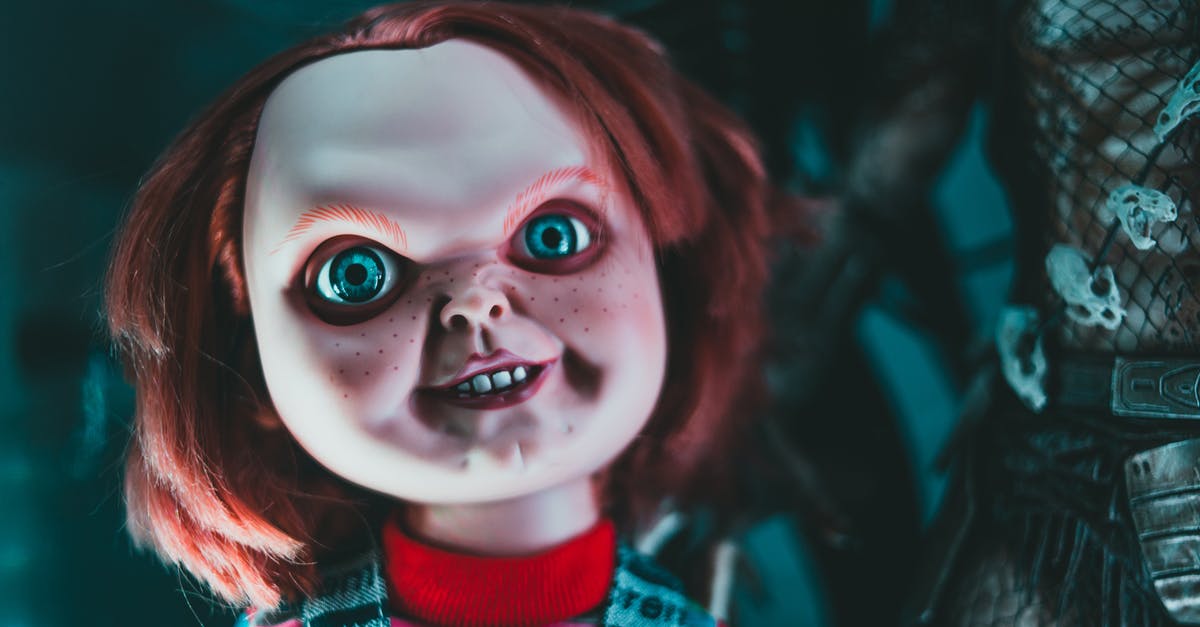 What happened to the scary, red-faced demon from Insidious series? - Doll with blue eyes and freckles on terrible face