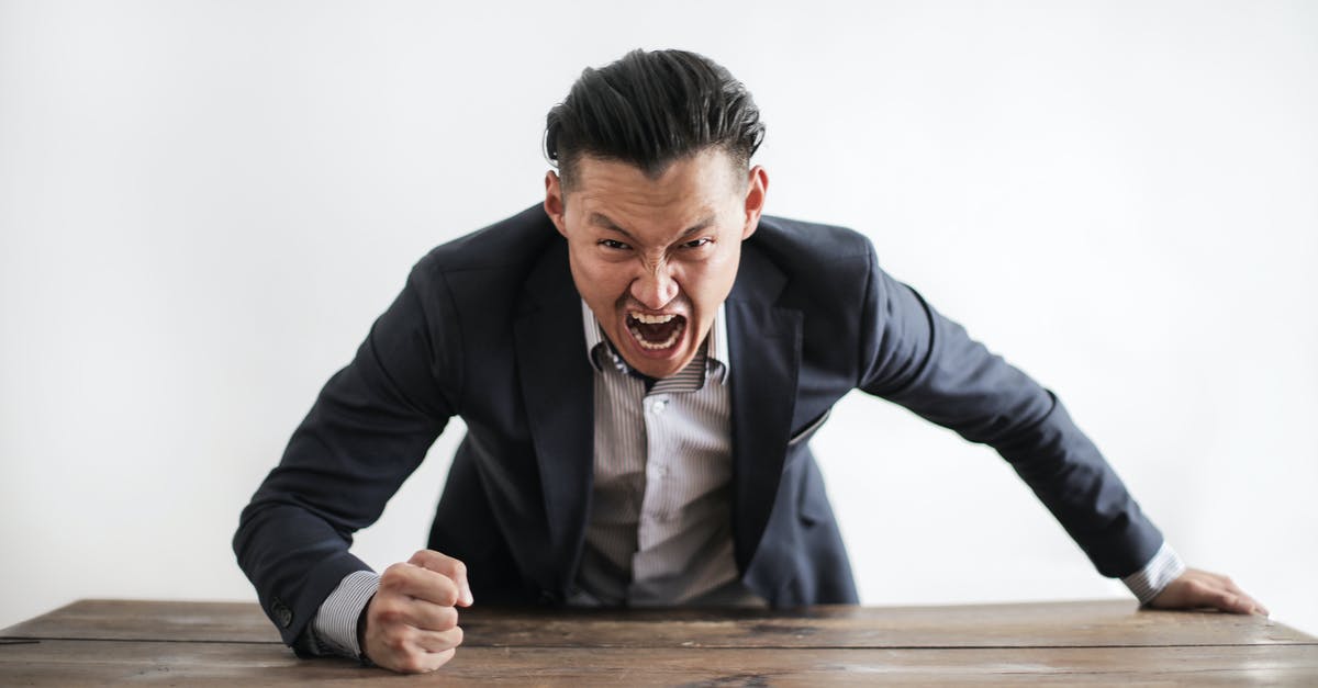 What is a negative pressure test and why did it give the results it did? - Expressive angry businessman in formal suit looking at camera and screaming with madness while hitting desk with fist