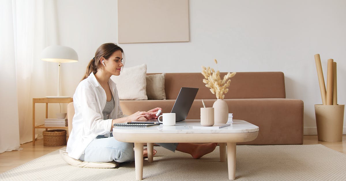 What is a seamless cross-cutting transition called? - Content woman using laptop on floor