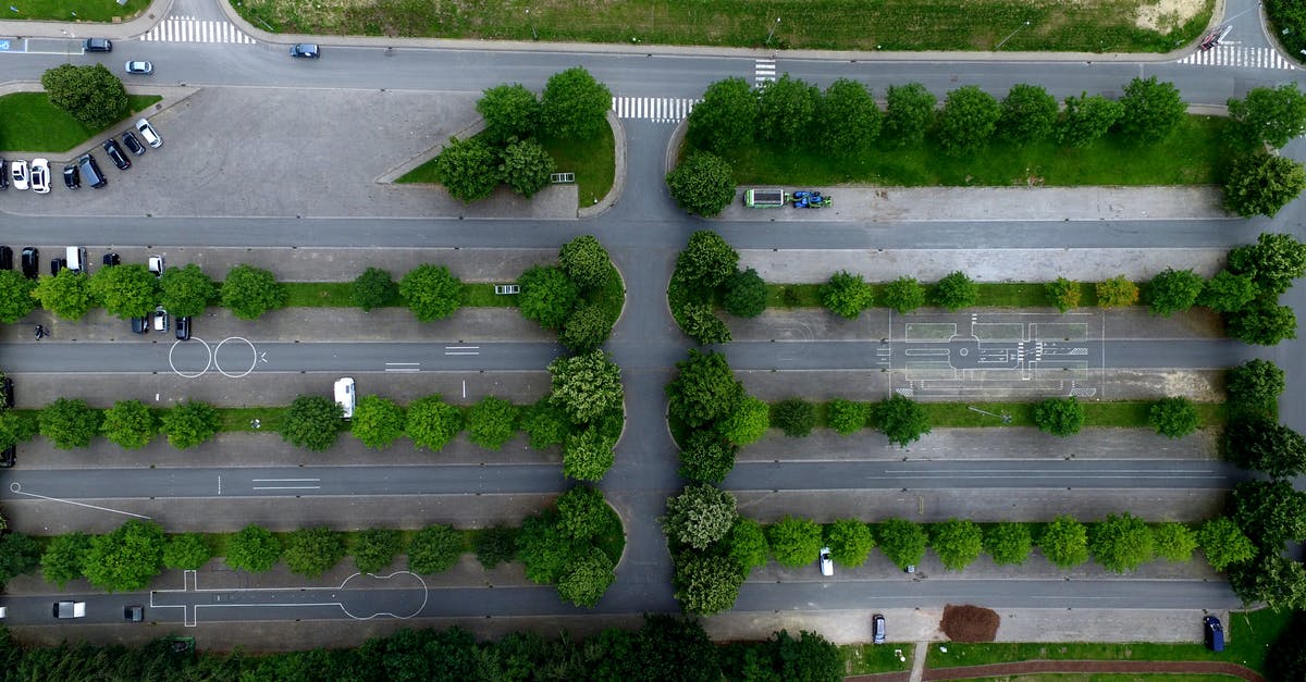 What is Bond's first line in Spectre? - Aerial Photography of Parking Lot With Trees