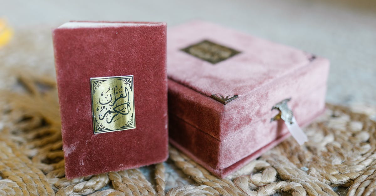 What is the Arabic saying behind “Angst essen Seele auf”? - Red and Gold Book on Brown Textile