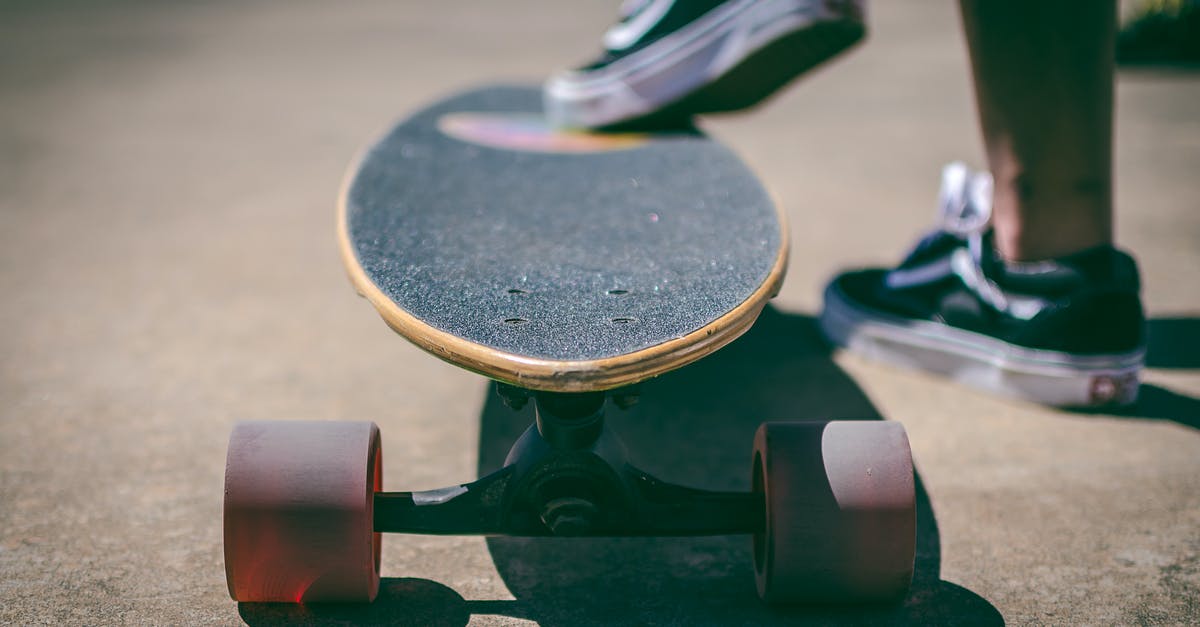 What is the difference between a grip and a key grip? - Shallow Focus Photography of Longboard