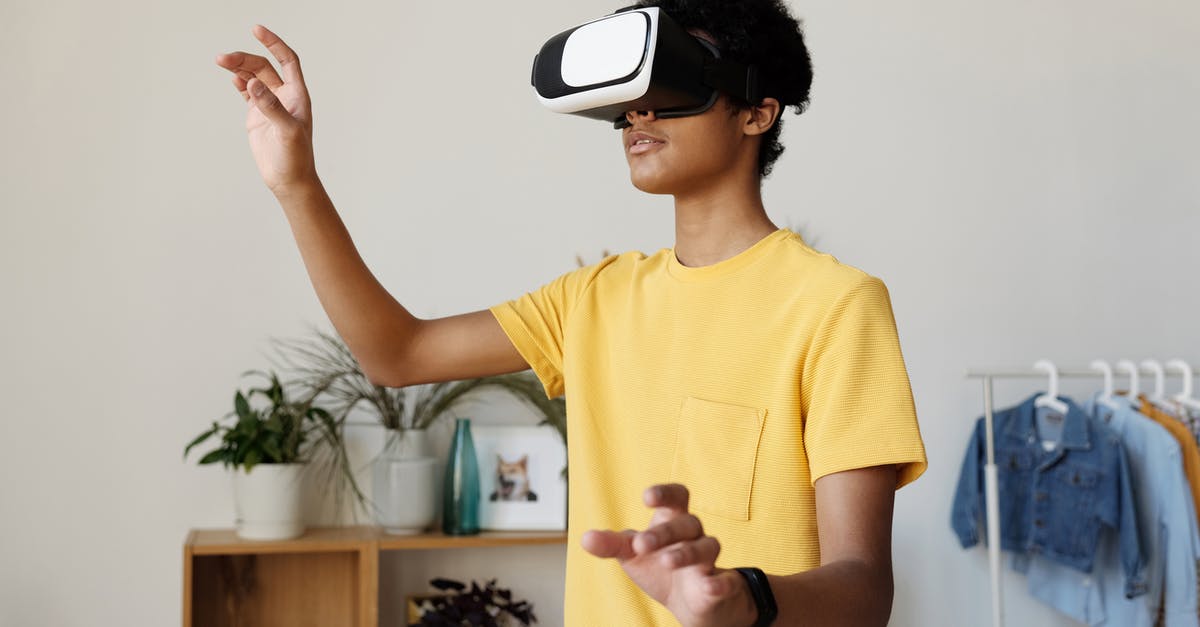 What is the game the kids of Lenny are playing in the TV in the movie Grown Ups? - Boy in Yellow Crew Neck T-shirt Wearing White and Black Vr Goggles