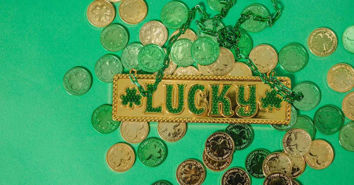 What is the importance of the souvenir from Lagos, Nigeria? - Golden lucky charm on coins