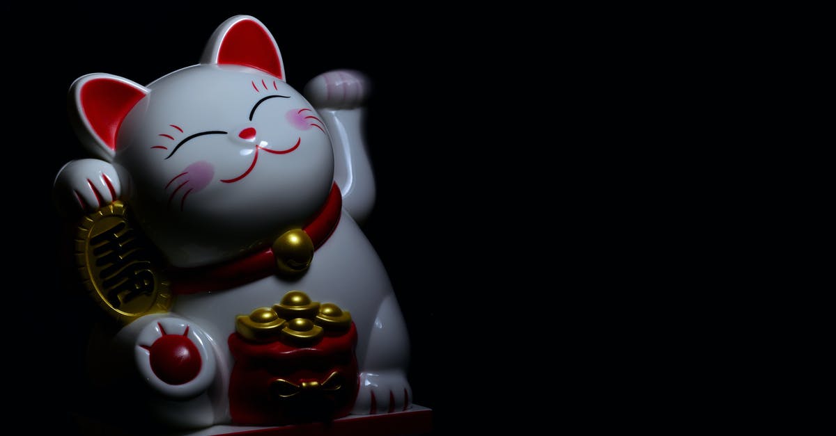 What is the meaning of the Chinese symbol that Oogway uses to attack Kai? - Photo of Maneki-neko Figurine