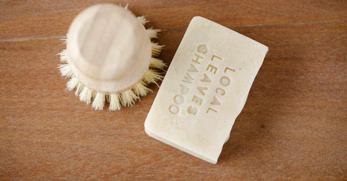 What is the meaning of the phrase 'sometimes the bar eats you' in The Big Lebowski? - Top view of zero waste beauty brush and dry shampoo with inscription on brown background
