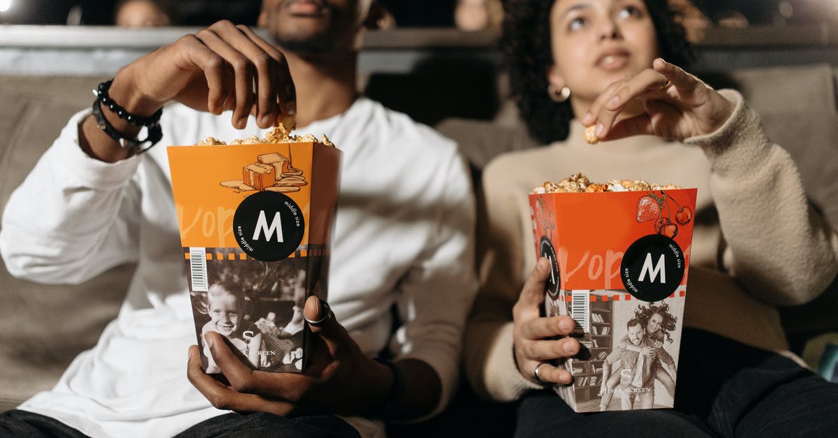 What is the name of the movie in which eating and toilet taboos are reversed [closed] - Couple Eating Popcorn Together