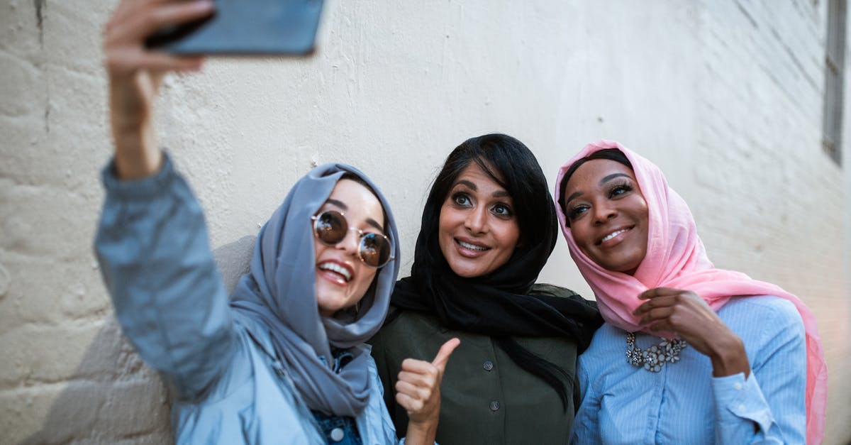 What is the origin of the dialogue "take me instead of her/him"? - 3 Women Wearing Hijab Taking a Selfie
