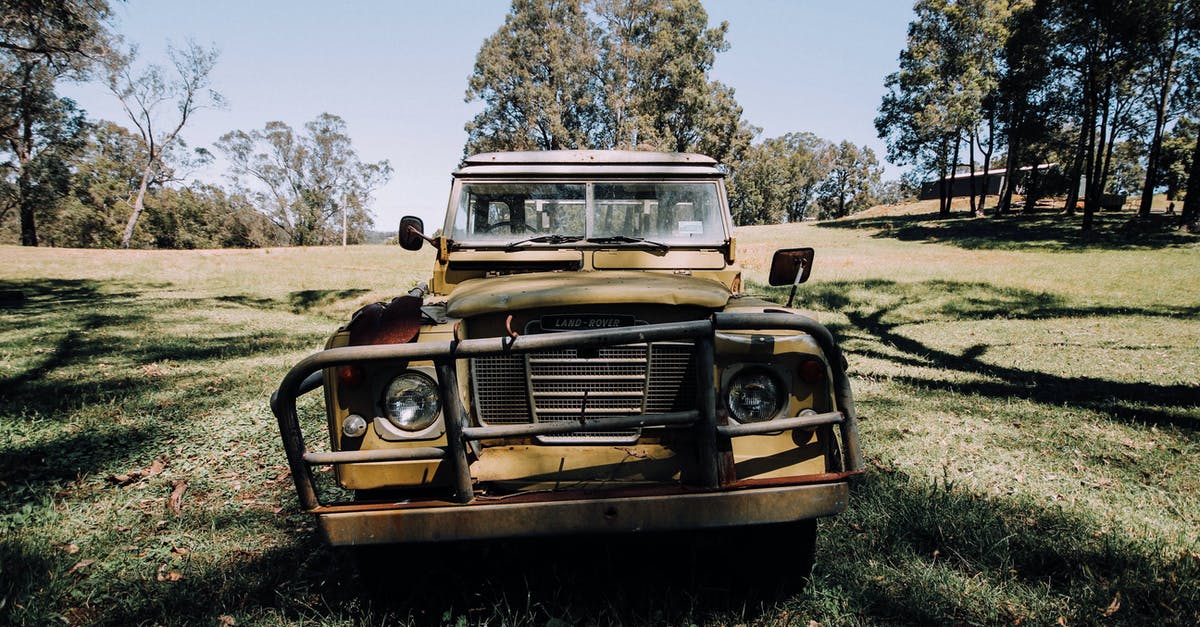 What is the real vehicle used as The Highwayman's truck? - Grunge abandoned car left on grassy meadow