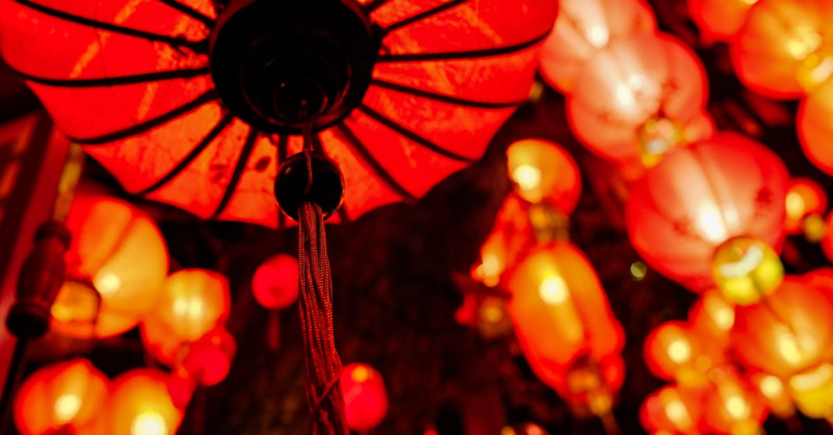 What is the red cord around the chest of Shaolin fighters? - Decorative shiny Chinese lanterns in New Year holiday