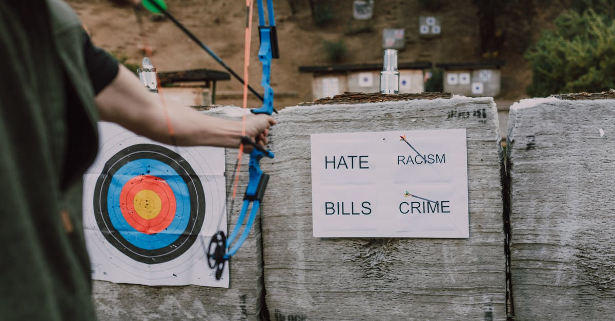What is the relationship between the Human Target TV series and the Human Target appearing in Arrow season 5? - Free stock photo of accuracy, adult, aim