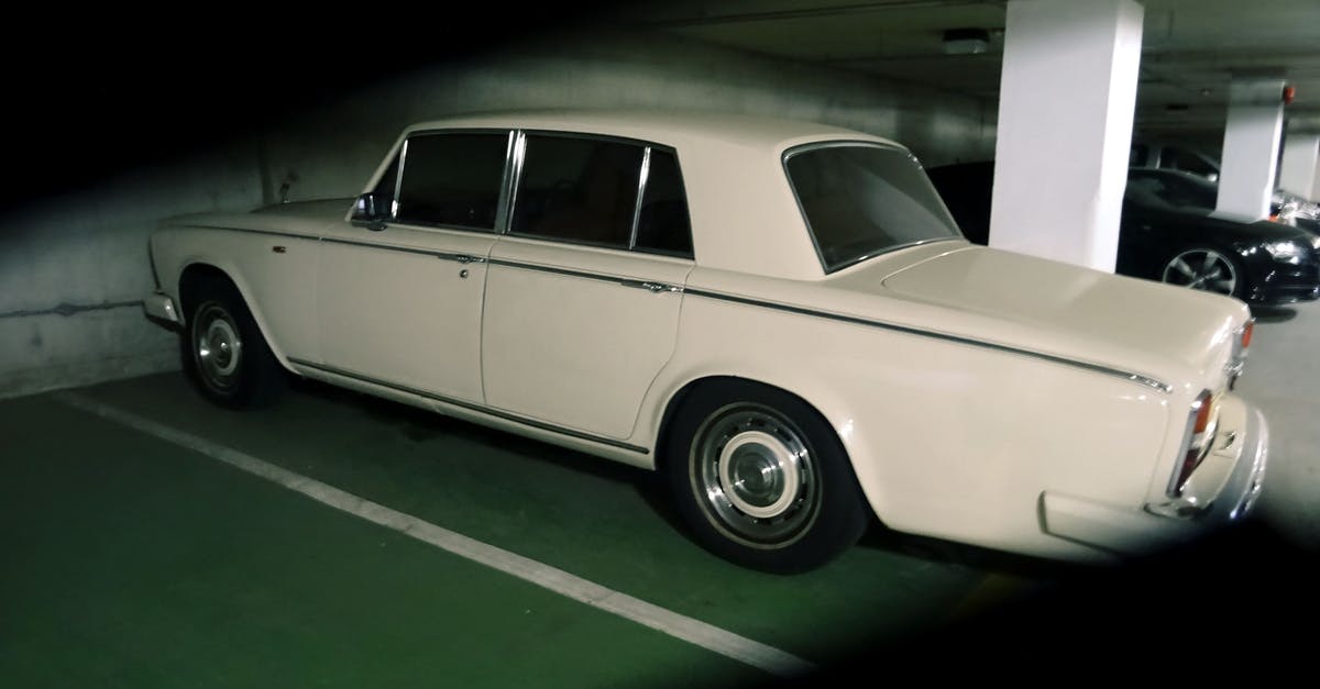 What is the significance of silver colored vehicles in The Host (2013)? - Photography of Vintage Car Parked on a Parking Lot