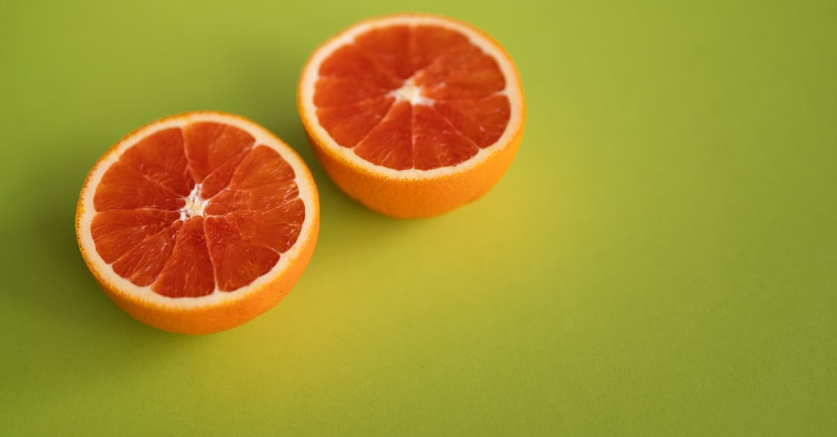 What is the term for a cut from one close-up object to another absurdly similar close-up object? [duplicate] - Tasty ripe citrus fruit with juicy pulp cut in half placed together on bright green surface