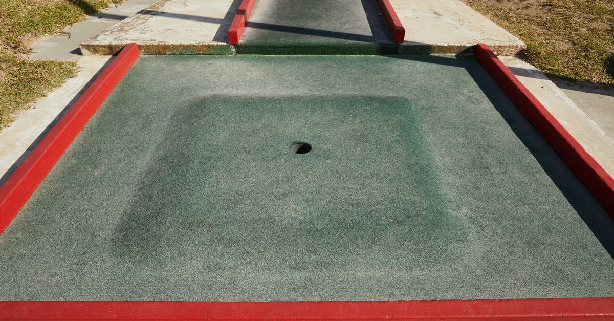 What is the term the street thugs called the policemen in Sherlock Holmes: A Game of Shadows? - Small round hole in center of square dark green area for mini golf in daytime