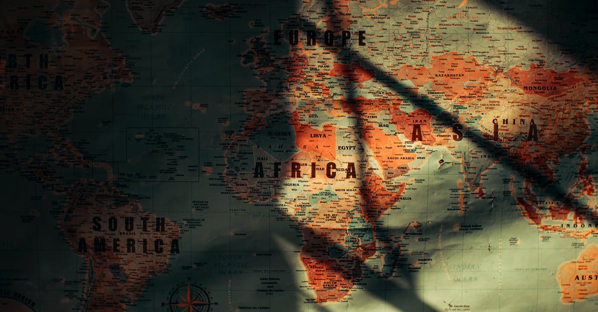 What is this Northern British location in the opening scene of West is West? - From above of sunlit aged paper world map with continents countries and oceans
