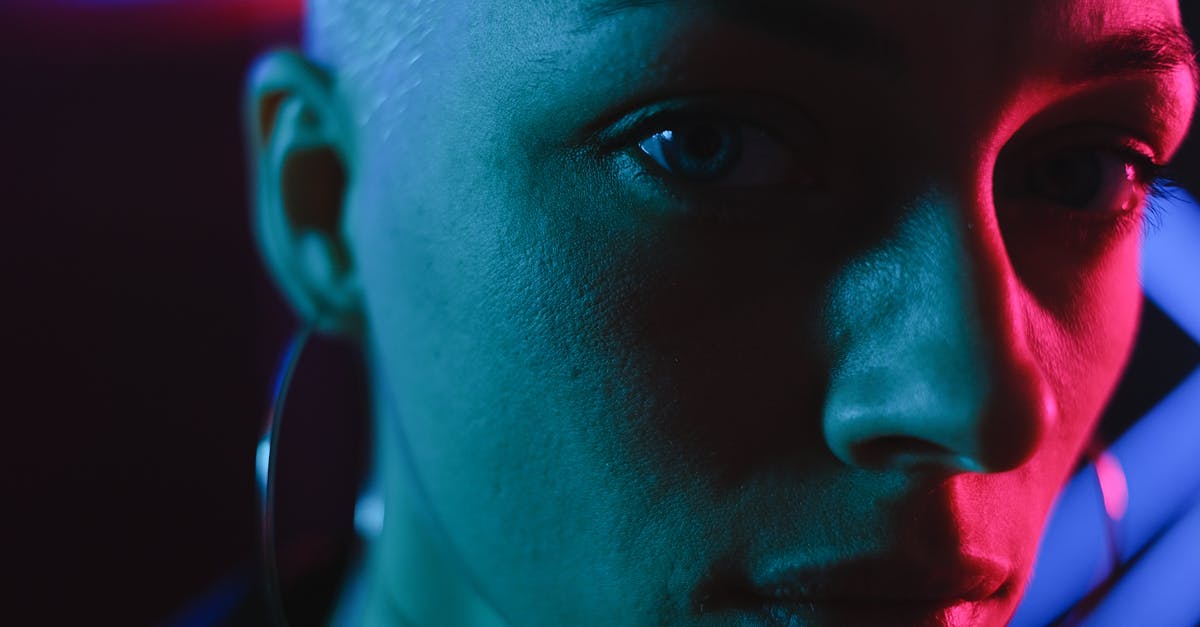 What is this shining look like effect called? - Crop bald woman in neon lights