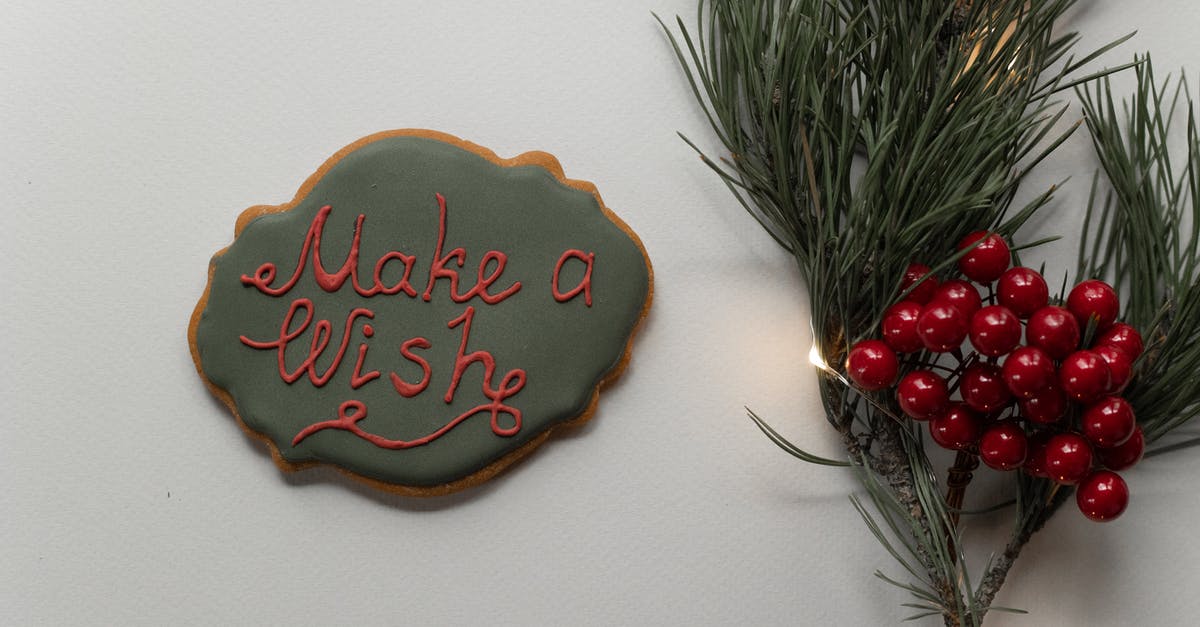 What makes Die Hard a Christmas movie? - Holiday inscription on cookie and spruce branch