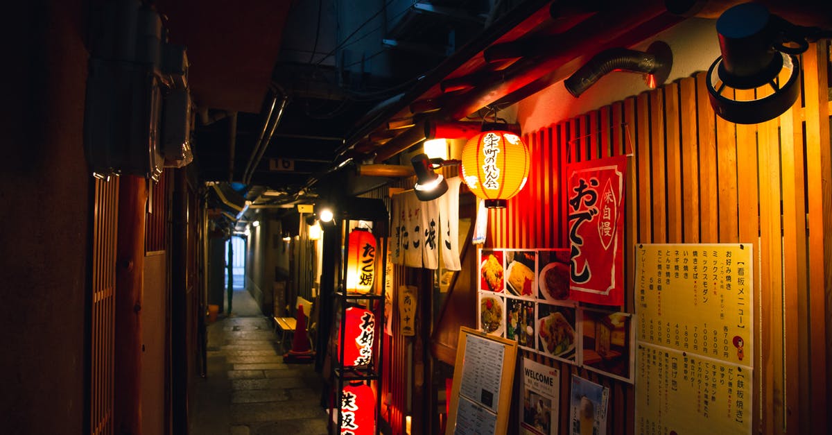 What proved that Midway was the location the Japanese were calling AF? - Narrow street with traditional Japanese izakaya bars decorated with hieroglyphs and traditional red lanterns in evening