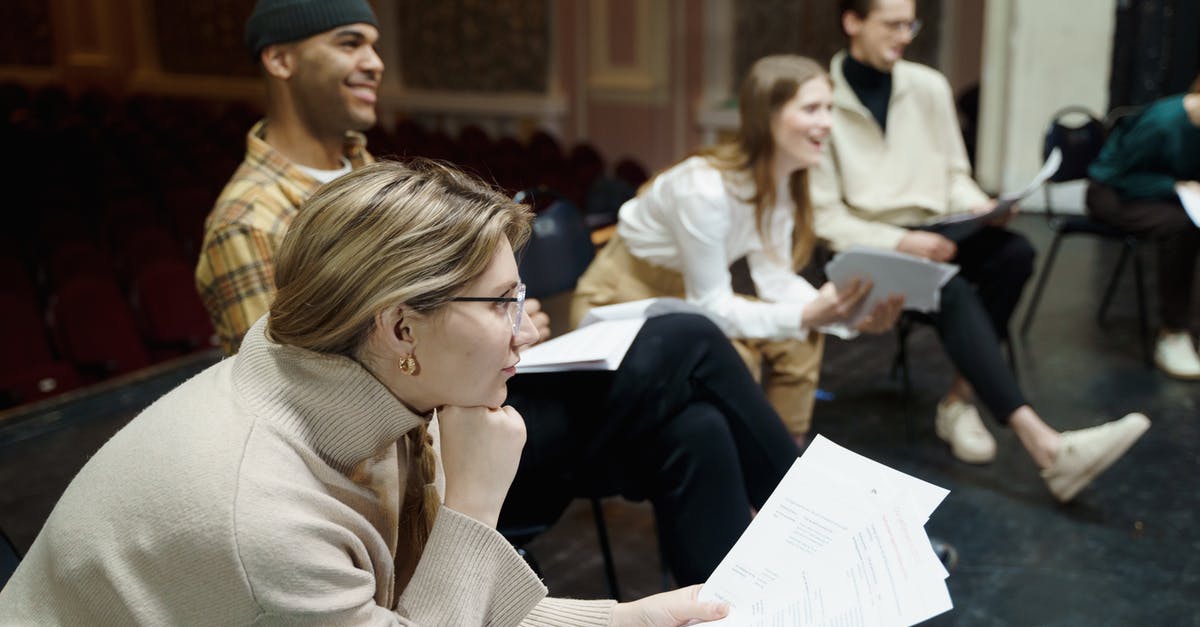 What traits do theater actors have? - Group Of People Sitting With Their Scripts 
