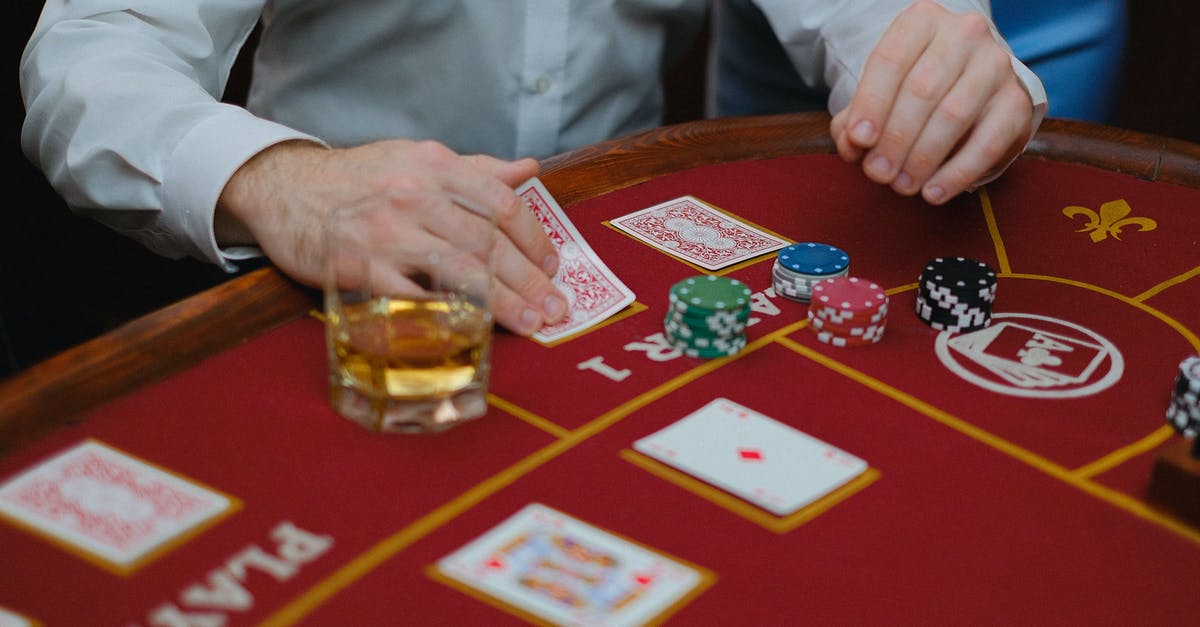What version of Casino (1995) is the uncut version? - A Person Playing Cards on Casino Table