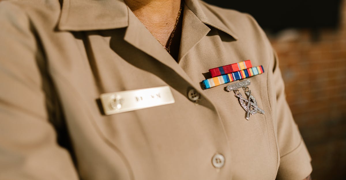 What was Edna Harper's military rank on Everwood? - Close-Up Photo of Person Wearing Beige Military Uniform 