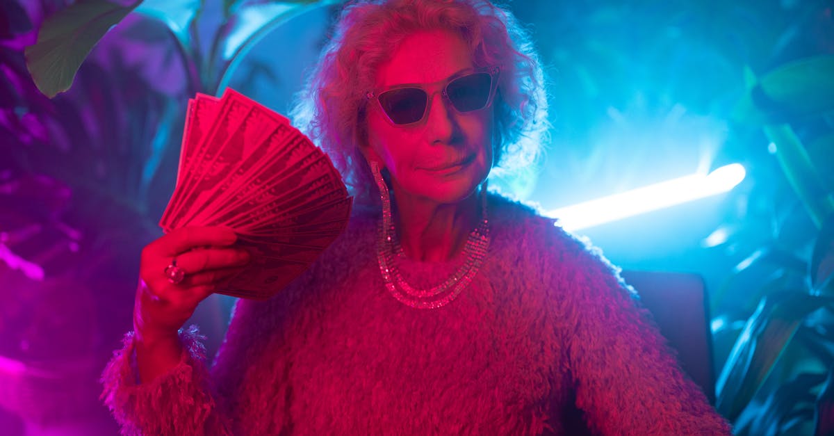 What was Kyle really after in Money Monster? - Photo of an Elderly Woman Flaunting Money 