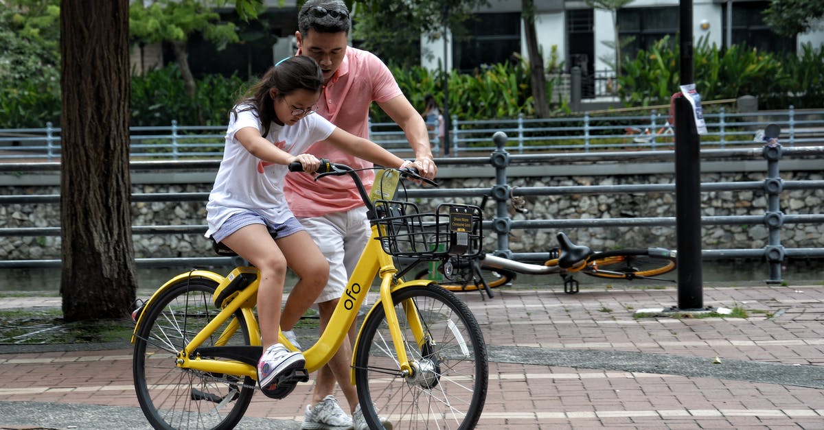 What was left of Luke's training? - Photography of Girl Riding Bike Beside Man