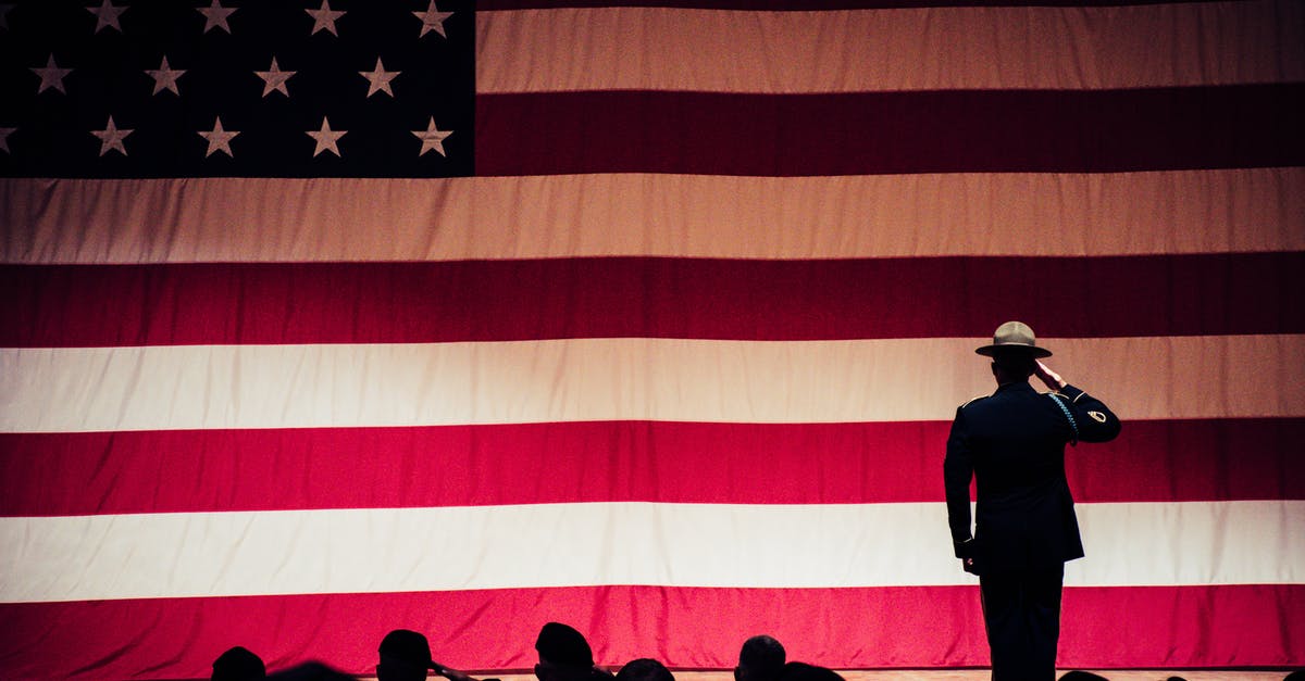 What was the chest-level salute the Union soldiers used in Gettysburg? - Man Standing On Stage Facing An American Flag