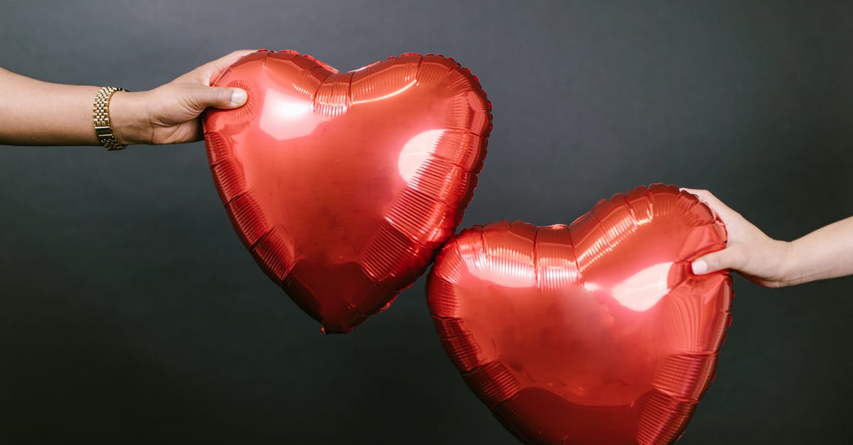 What was the motive for trying to destroy Andy's relationship with Becky? - Two Persons Holding Two Red Heart Shaped Balloons