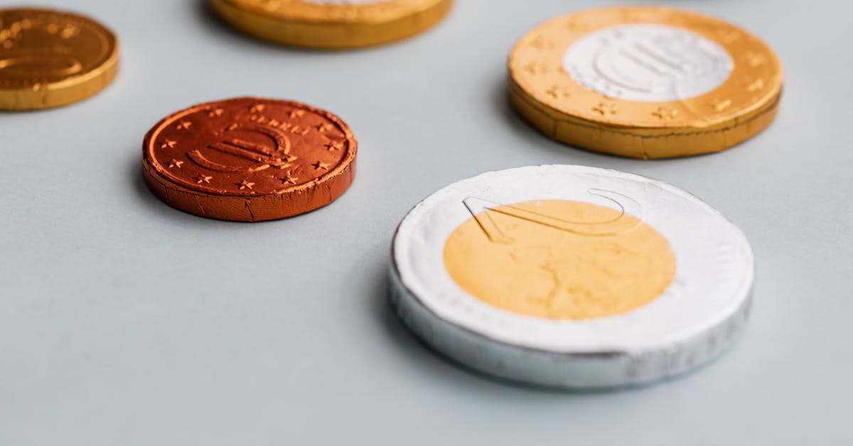What was the purpose of Johnny Utah firing several rounds into the air? - Chocolate coins on white surface