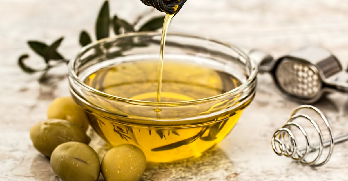 What was the substance hidden in the Olive Oil in the Clancy series Jack Ryan? - Bowl Being Poured With Yellow Liquid