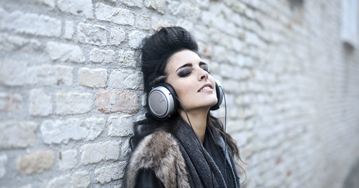 What was the well-known Russian song Lean wanted for Doctor Zhivago? - Informal young woman listening to music near grunge wall