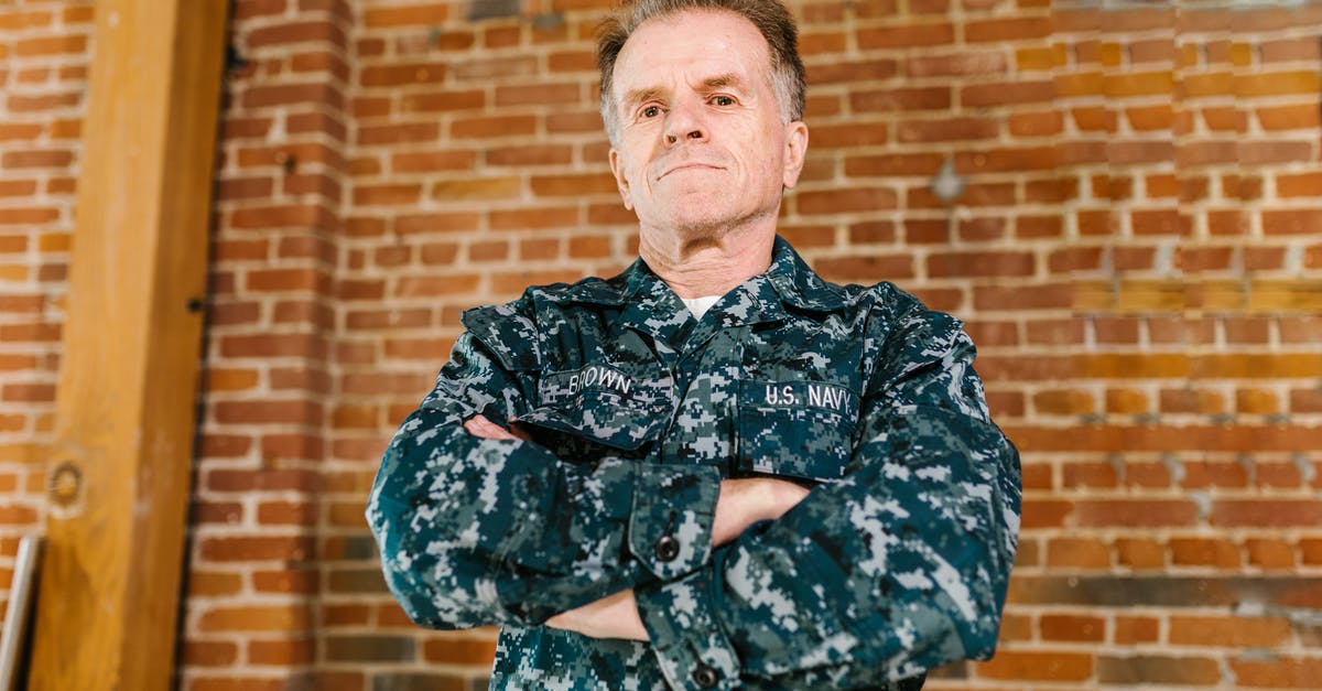 What were all the fighters in previous Age of Heroes? - Photo of US Navy Soldier Doing Crossed Arms