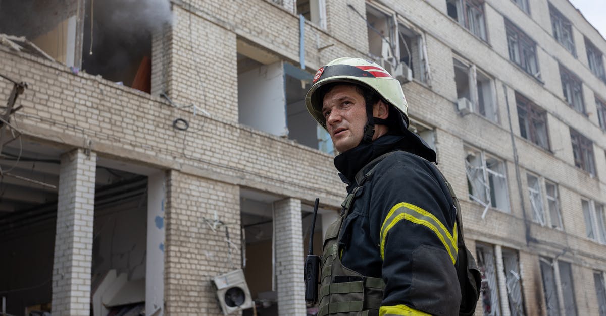 What would you call this specific war scene effect? - Firefighter in front of a Residential Building Destroyed by Shelling