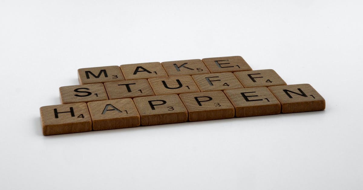 Whatever happened to Jenny Tyler? - Close-Up Shot of Scrabble Tiles on White Background